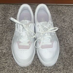 White Puma trainers with light purple and lilac acents!